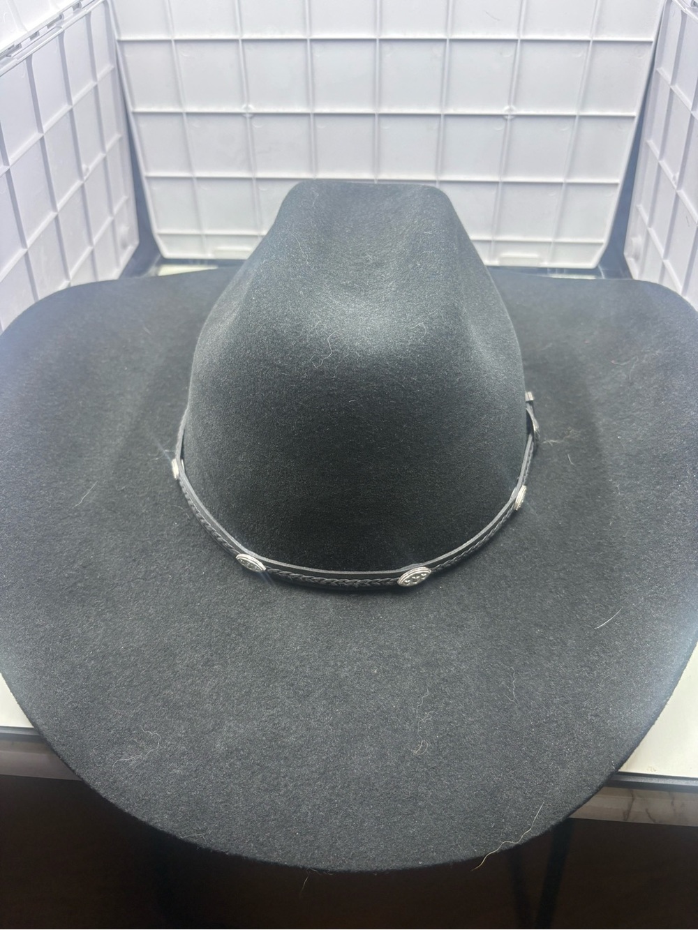 Master Hat of Texas black cowboy hat with silver band and decorative conchos